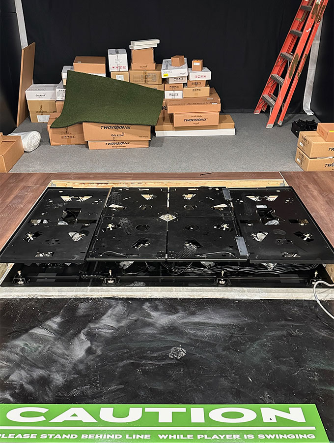 Another view of a swingplate being installed